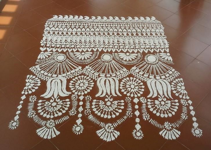 white mash kolam design 16