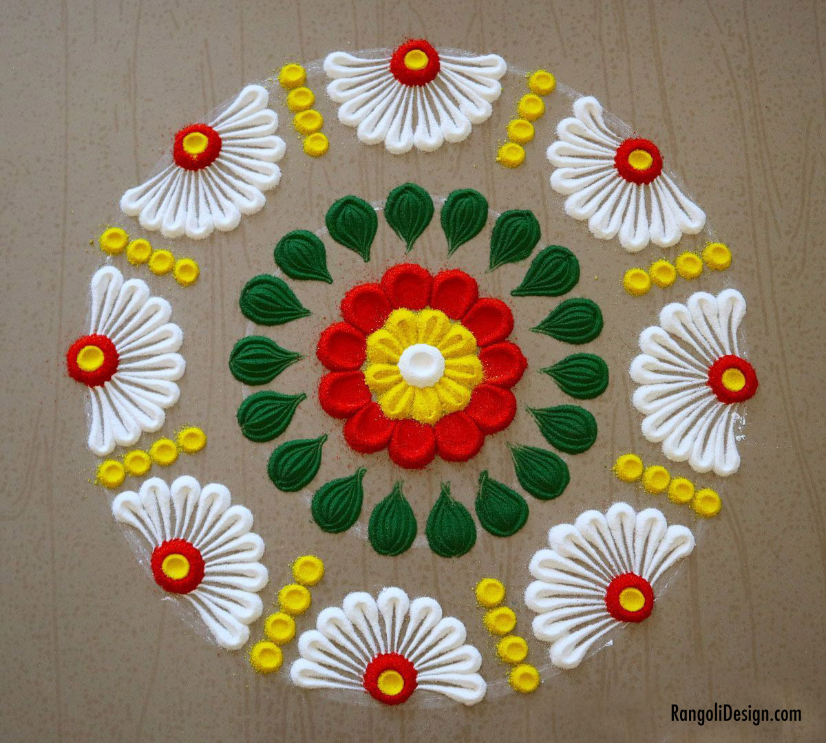 pile rangoli design kids by menaka rangoli 24