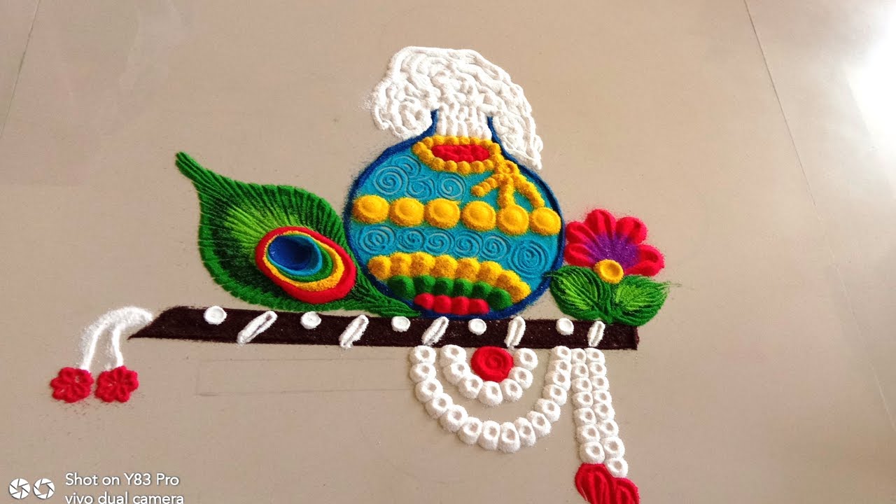krishna jayanthi rangoli design multi colour butter pot by shakilaraj 17