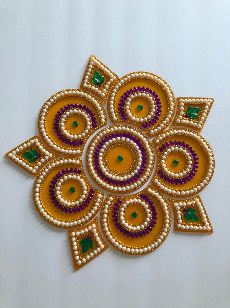 kundan rangoli design circles triangles