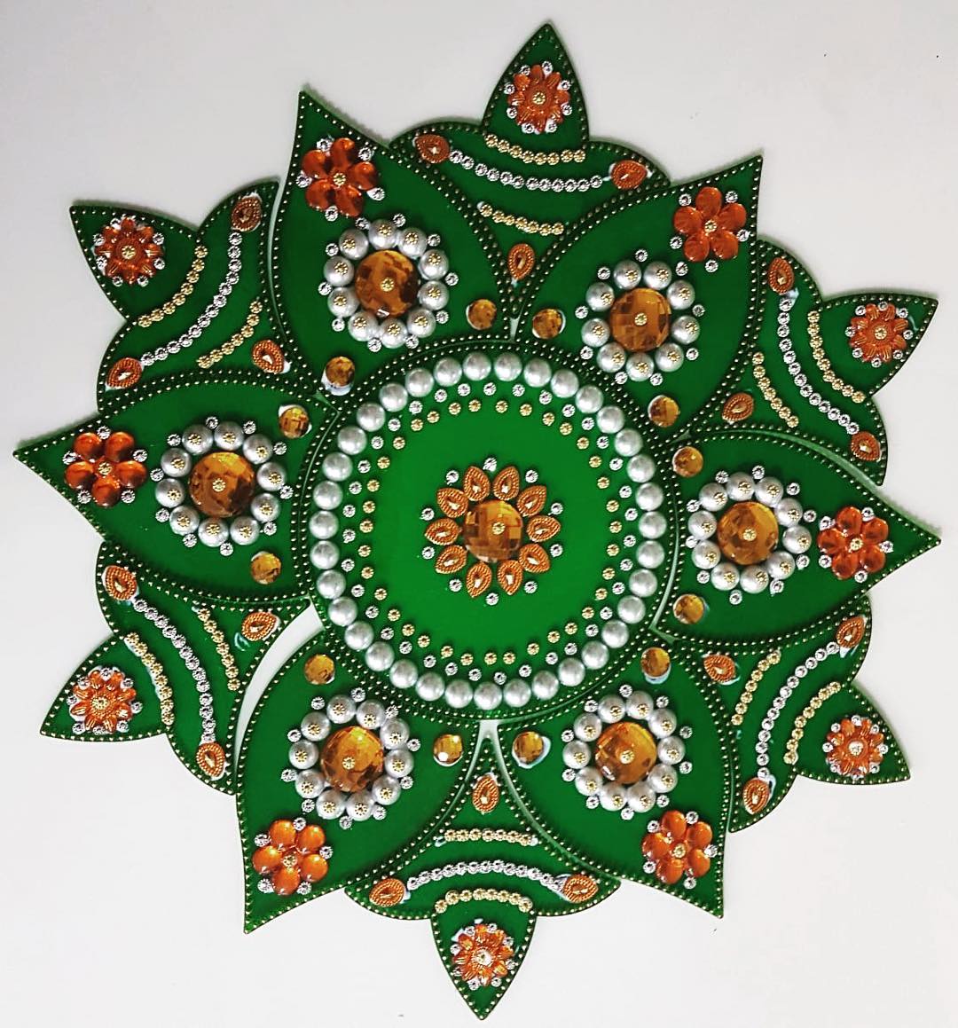 kundan rangoli design singing stones